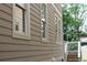 Exterior of the house with many windows and wooden sidings at 106 Hogue St, Atlanta, GA 30312