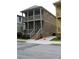 Exterior front elevation with a two story porch and brick staircase at 106 Hogue St, Atlanta, GA 30312