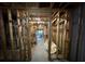 Unfinished basement with exposed framework, pipes, and concrete floors, offering a blank canvas for customization at 3240 Letha Woods Sw Dr, Conyers, GA 30094