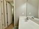 Well-lit bathroom with a large vanity and a clean, modern design at 3240 Letha Woods Sw Dr, Conyers, GA 30094