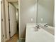 Single sink vanity and tile floor featured in a bathroom at 3240 Letha Woods Sw Dr, Conyers, GA 30094