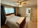 Bedroom featuring wood bed frame, and a bathroom for extra comfort at 3240 Letha Woods Sw Dr, Conyers, GA 30094