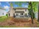 Backyard view highlighting the deck, perfect for outdoor dining and relaxing in a serene setting at 3969 Bear Ridge Nw Pl, Kennesaw, GA 30144