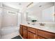 This bathroom features a double sink vanity and a tub with shower at 3969 Bear Ridge Nw Pl, Kennesaw, GA 30144