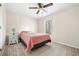 A cozy bedroom features neutral walls, carpeted floors, and a window at 3969 Bear Ridge Nw Pl, Kennesaw, GA 30144