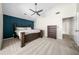 Bedroom featuring carpet floors, a large bed and desk at 3969 Bear Ridge Nw Pl, Kennesaw, GA 30144