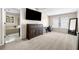 Main bedroom with carpet, vaulted ceilings, and accent wall at 3969 Bear Ridge Nw Pl, Kennesaw, GA 30144