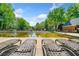 Community pool with lounge chairs and ample space for relaxation and recreation at 3969 Bear Ridge Nw Pl, Kennesaw, GA 30144