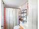 Bathroom with a combined tub and shower and vintage-style fixtures at 1336 Shirley Dr, Sugar Hill, GA 30518