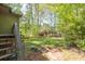 Relaxing backyard surrounded by lush greenery at 1878 Suwanee Roberts Ct, Lawrenceville, GA 30043