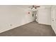 Bedroom with neutral carpeting, white walls, and a back door to the backyard at 1878 Suwanee Roberts Ct, Lawrenceville, GA 30043