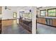 Open-concept kitchen with tile floors, stainless steel appliances, granite countertop, and view to the living room at 1878 Suwanee Roberts Ct, Lawrenceville, GA 30043
