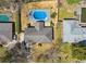 An aerial view showcases the property's layout, including the pool and surrounding landscape at 6501 Menlo Way, Rex, GA 30273