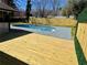 A refreshing inground pool is accessible from a fresh stained deck in this backyard at 6501 Menlo Way, Rex, GA 30273