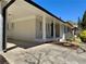 Spacious covered carport featuring painted brick with access doors and ample parking space at 6501 Menlo Way, Rex, GA 30273