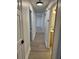 Hallway with hardwood floors leading to bedrooms and bathrooms at 6501 Menlo Way, Rex, GA 30273