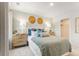 Comfortable bedroom with stylish decor, including a cozy bed and wood accents at 1032 Sutherland Lane (Lot 47), Lawrenceville, GA 30043