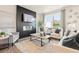 Bright living room features a modern fireplace, recessed lighting, and stylish decor at 1032 Sutherland Lane (Lot 47), Lawrenceville, GA 30043