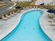 An overhead shot of the community's kidney-shaped pool, complete with lounge chairs and tables at 1032 Sutherland Lane (Lot 47), Lawrenceville, GA 30043