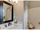 Bright bathroom with shower/tub combination and modern fixtures at 10355 Oxford Mill Cir, Johns Creek, GA 30022
