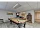 Spacious recreation room features a billiards table and entertainment area, perfect for leisure and hosting at 10355 Oxford Mill Cir, Johns Creek, GA 30022