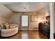 Cozy sitting room with hardwood floors and accent furniture at 10355 Oxford Mill Cir, Johns Creek, GA 30022