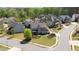 Suburban neighborhood featuring well-maintained homes, green lawns, and tree-lined streets at 147 Johnston Farm Ln, Woodstock, GA 30188