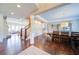 Elegant dining room with hardwood floors and stylish decor, perfect for entertaining guests at 147 Johnston Farm Ln, Woodstock, GA 30188