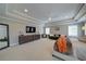Expansive main bedroom featuring a sitting area, large windows, and a sophisticated decor style at 147 Johnston Farm Ln, Woodstock, GA 30188