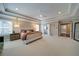 Large main bedroom with a cozy seating area and access to an ensuite bathroom with modern amenities at 147 Johnston Farm Ln, Woodstock, GA 30188