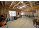 Spacious unfinished basement with exposed framing, natural light, and ample storage potential at 147 Johnston Farm Ln, Woodstock, GA 30188