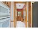 Compact kitchen with a microwave, cabinets, and open doorway to another room at 7700 Dunvegan Close, Atlanta, GA 30350