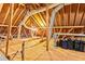 Unfinished attic space perfect for storage and projects with visible beams at 8518 Shoreview Ct, Jonesboro, GA 30236