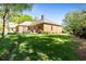 Expansive backyard with a well-manicured lawn and brick home exterior, ideal for outdoor activities at 8518 Shoreview Ct, Jonesboro, GA 30236