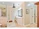 Bathroom featuring tiled walk-in shower, granite countertop, and a decorative stained glass window at 8518 Shoreview Ct, Jonesboro, GA 30236