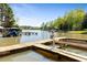 Private boat dock equipped with a boat lift, offering easy access to the lake at 8518 Shoreview Ct, Jonesboro, GA 30236