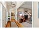 Elegant foyer leading to a living room featuring a fireplace and hardwood floors at 8518 Shoreview Ct, Jonesboro, GA 30236