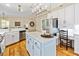 Bright, open kitchen showcasing an island, modern fixtures, and plenty of storage at 8518 Shoreview Ct, Jonesboro, GA 30236