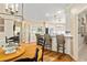 Charming kitchen featuring a breakfast bar, eat-in nook, and abundant natural light at 8518 Shoreview Ct, Jonesboro, GA 30236