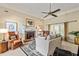 Inviting living room with cozy fireplace, plush seating, and elegant decor at 8518 Shoreview Ct, Jonesboro, GA 30236