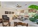 Spacious living room with a cozy seating area, fireplace, and elegant decor at 8518 Shoreview Ct, Jonesboro, GA 30236