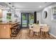 Stylish kitchen with pendant lighting, island seating, and a cozy breakfast nook at 2921 Country Squire Ln, Decatur, GA 30033
