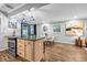 Kitchen with a granite-topped island, stainless steel appliances, updated cabinets, and a dining area in the background at 2921 Country Squire Ln, Decatur, GA 30033