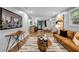 Spacious open living area with hardwood floors, neutral walls and kitchen view at 2921 Country Squire Ln, Decatur, GA 30033