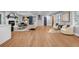 Open living room features hardwood floors, cozy fireplace, modern decor, and ample seating at 2921 Country Squire Ln, Decatur, GA 30033