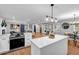 Open-concept living space featuring eat-in kitchen, dining area and a comfortable living room at 2921 Country Squire Ln, Decatur, GA 30033