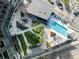 Aerial view showcasing a modern building with a unique rooftop pool, garden, and lounge area at 3107 Peachtree Ne Rd # 1403, Atlanta, GA 30305
