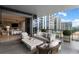 Expansive covered balcony featuring comfortable seating, great views, and an indoor-outdoor flow at 3107 Peachtree Ne Rd # 1403, Atlanta, GA 30305
