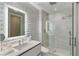 Modern bathroom with a glass-enclosed shower, illuminated mirror, and sleek fixtures at 3107 Peachtree Ne Rd # 1403, Atlanta, GA 30305