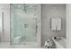 Clean and modern bathroom featuring a glass enclosed shower and a soaking tub at 3107 Peachtree Ne Rd # 1403, Atlanta, GA 30305